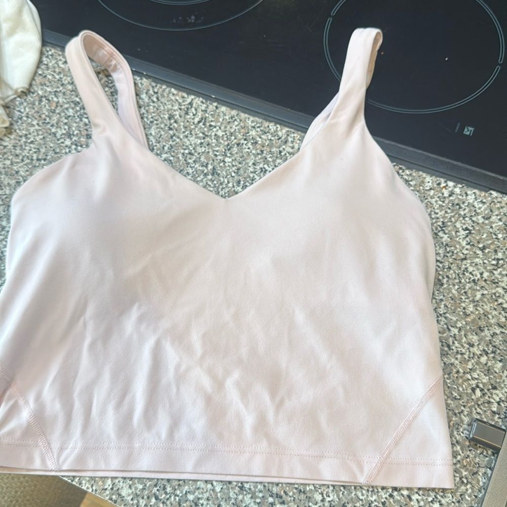 Light pink lululemon align cropped shirt . Unknown size , fits like small